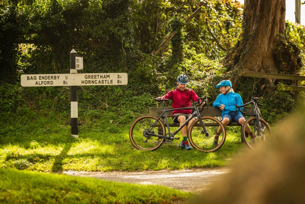 Cyclists on a bench in Lincolnshire Countryside