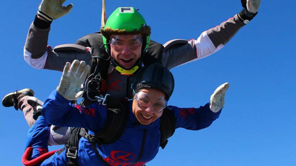 Two people skydiving tandem