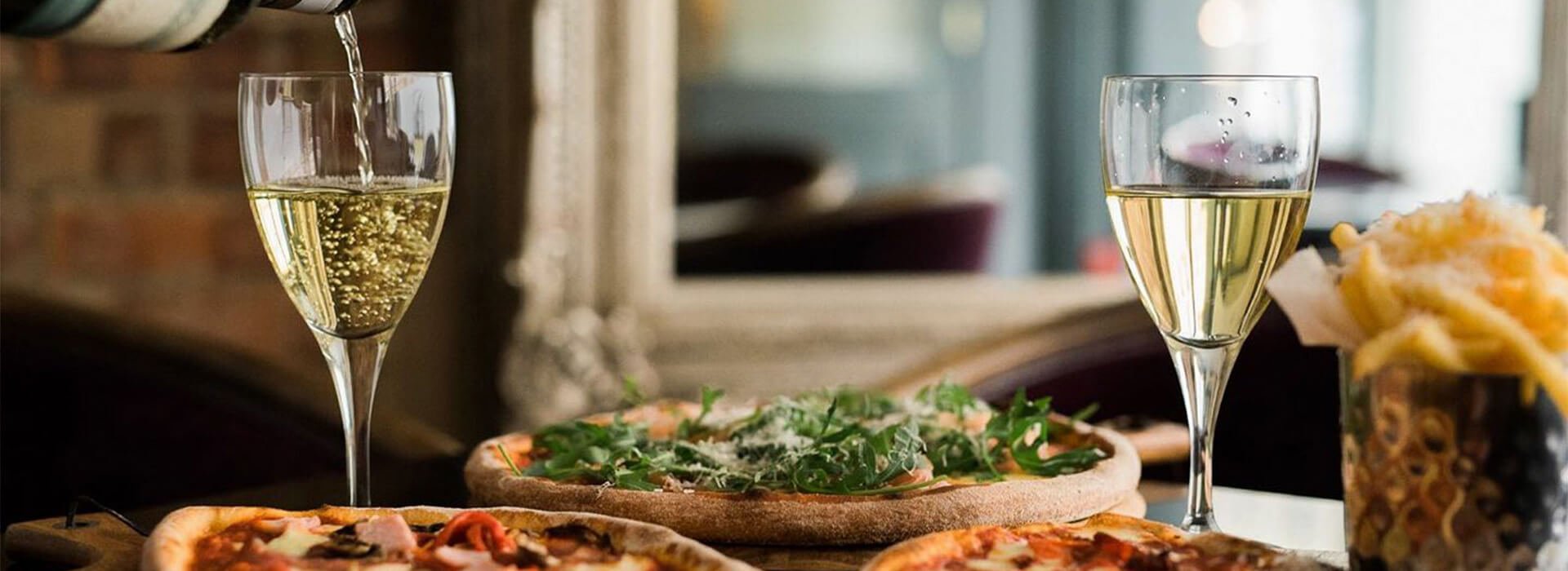 Cloisters Italian Bistro Header, wine and pizzas Cloisters Italian Bistro Header, wine and pizzas