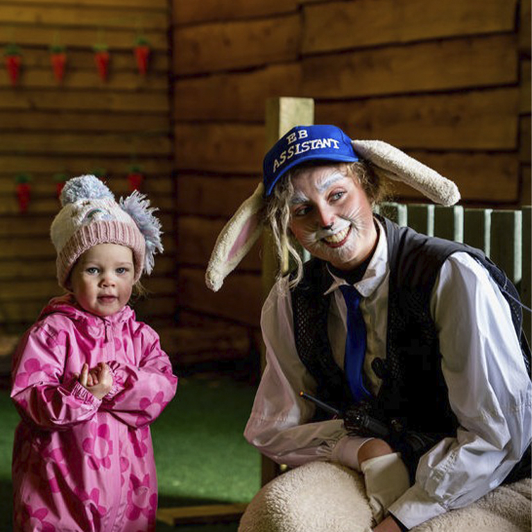 Easter Bunny Assistant at Easter Extravaganza at Rand Farm