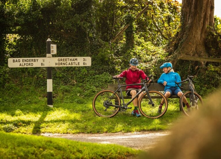 Cyclists on a bench in Lincolnshire Countryside